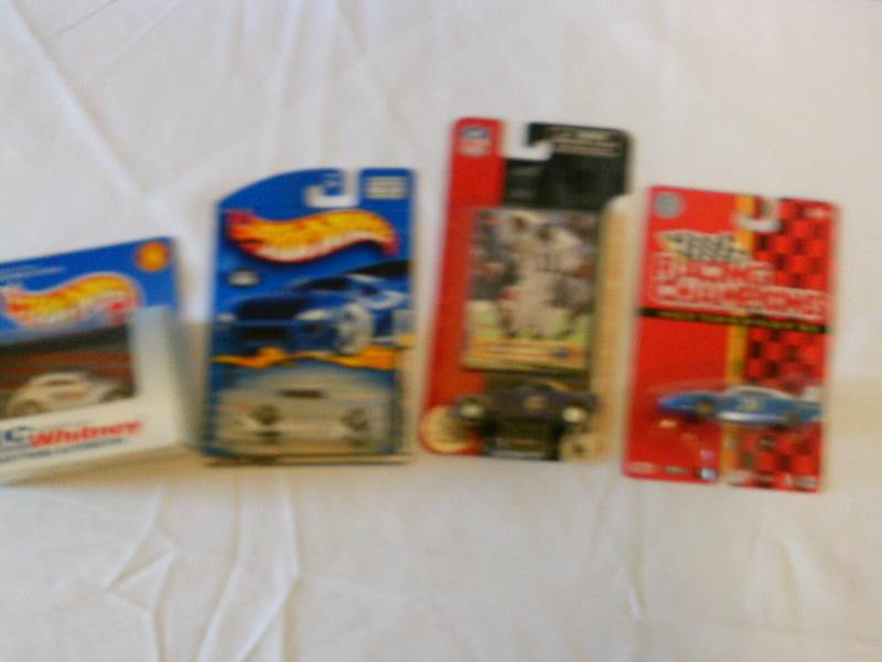lot 37 image: Hotwheels NFL Racing Champians Car (set of 4)