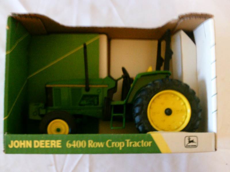 lot 41 image: John Deere 6400 Row Crop tractor (116 scale) ERTL New in Box