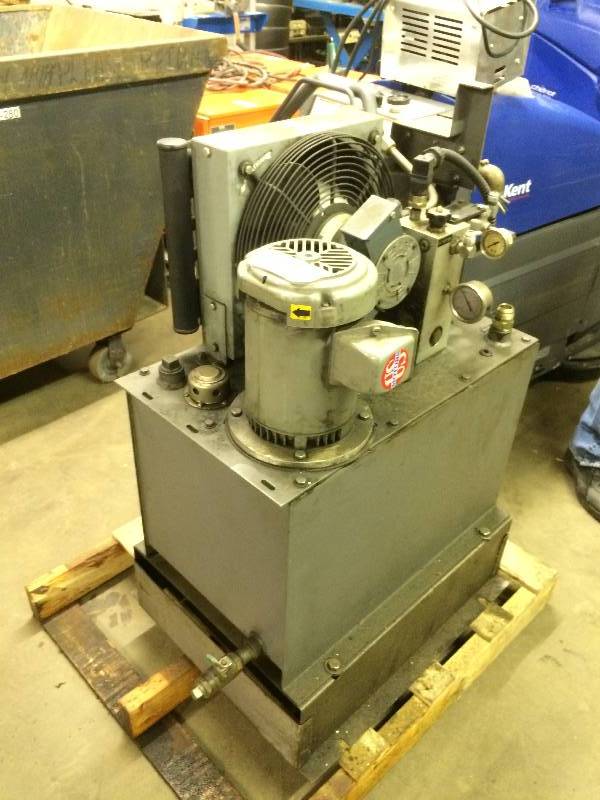 Hydraulic unit with heat exchanger