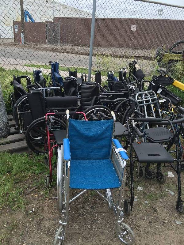 Lot of wheelchairs and walkers