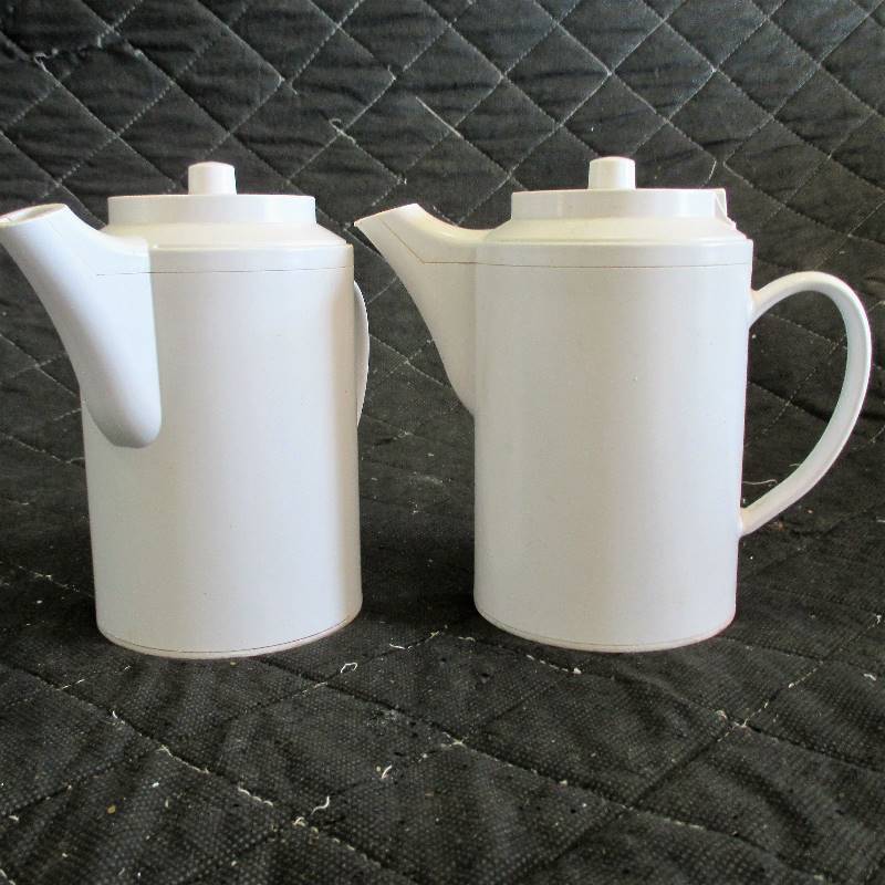 lot 34 image: 2 PLASTIC PITCHERS
