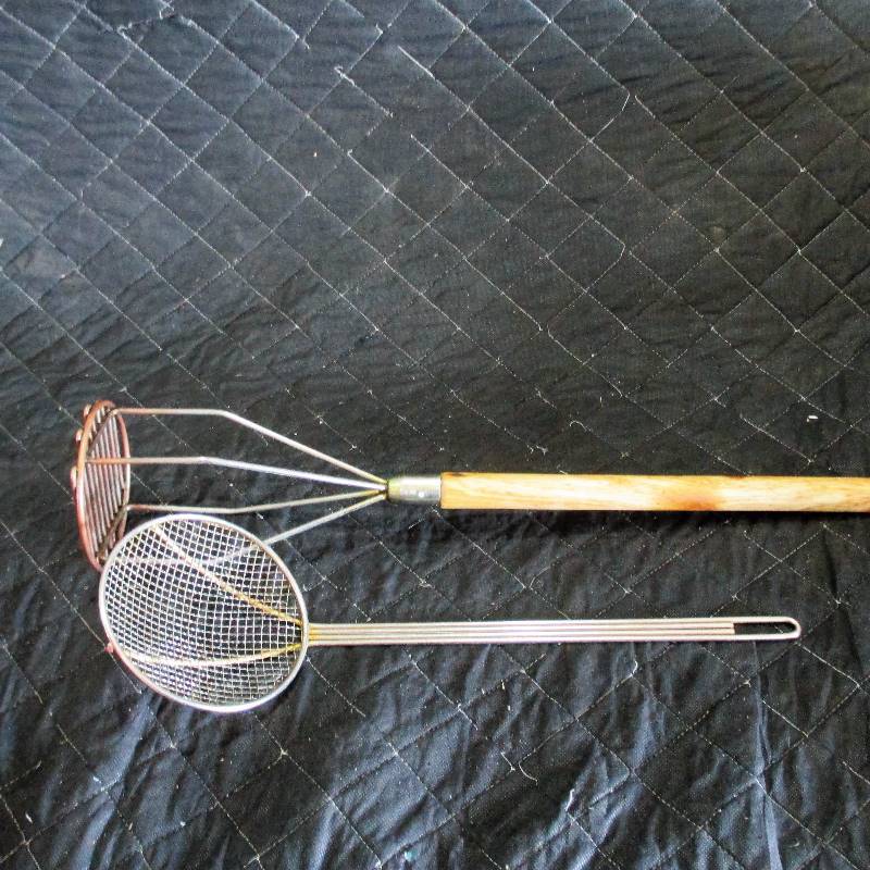 lot 74 image: 1- 24in TALL POTATO MASHER AND 1 STRAINER