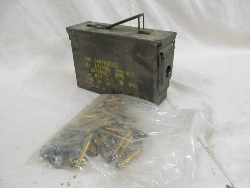 lot 130 image: military ammo box, empty brass casings