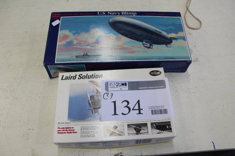 lot 134 image: Lot of (2) Scale Models Including 1) Glencoe Models 1330 Scale U.S. Navy Blimp AND 1) Testors Laird Solution Golden Age Racer
