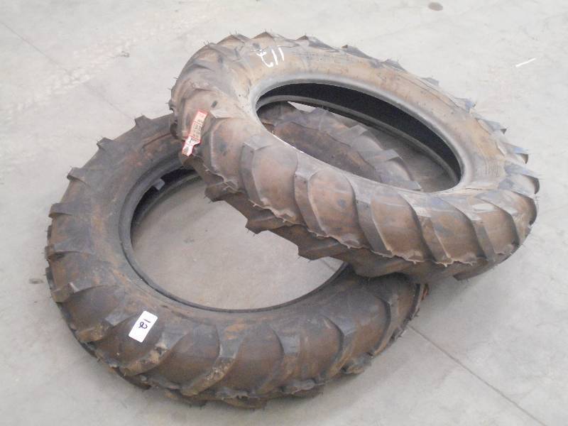 lot 12 image: (2) New Titan 7.5020 Traction Trac...
