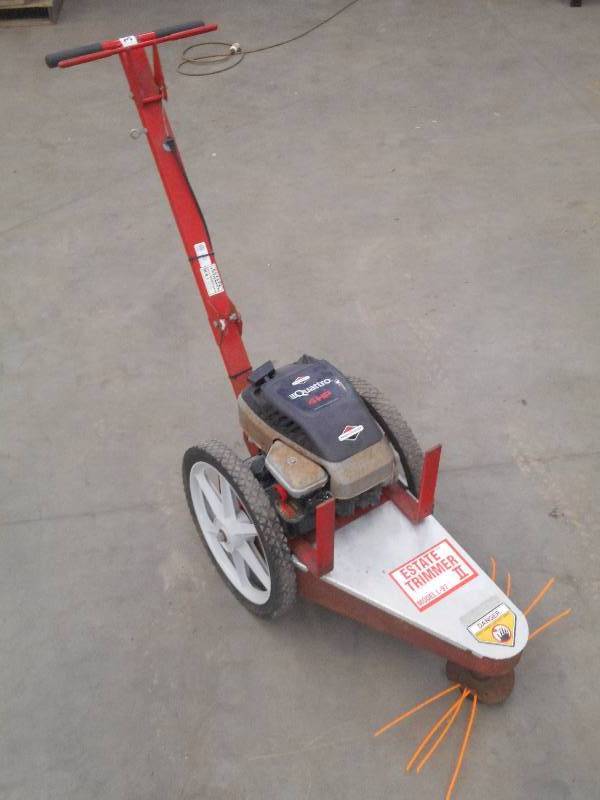 lot 31 image: Estate Model L-97 Walk-Behind Trimm...