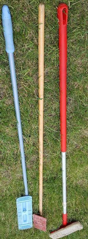 Lot of three dust mops