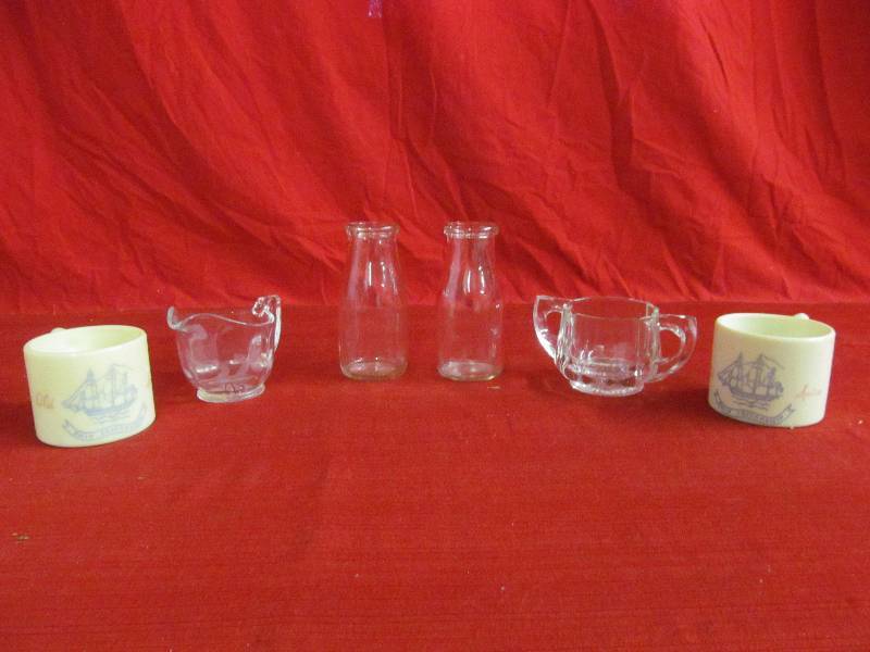 lot 1 image: Vintage Milk Bottles