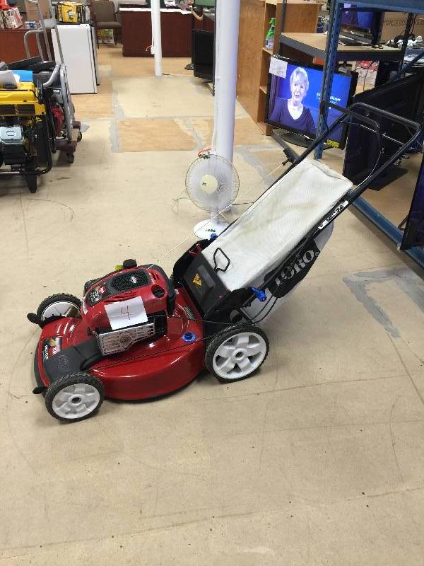 lot 4 image: Toro 22 in. High Wheel Variable Speed Self-Propelled Walk-Behind Gas Lawn Mower with SmartStow Model # 20339 in like New Working conditions