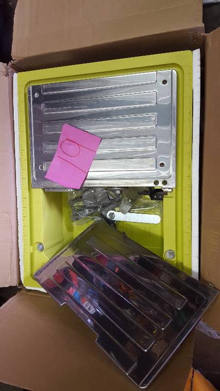 lot 19 image: Ryobi 7 in Wet Tile Saw New