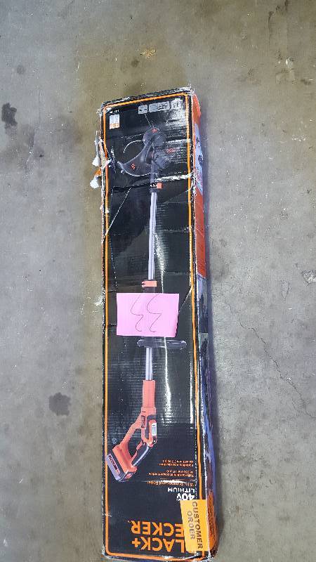 lot 33 image: Black and Decker 40 Volt Lithium 13 in Trimmer and Edger New