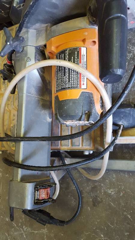 lot 72 image: Lot of 2 Ridgid Saws as is, missing pieces, they turn on
