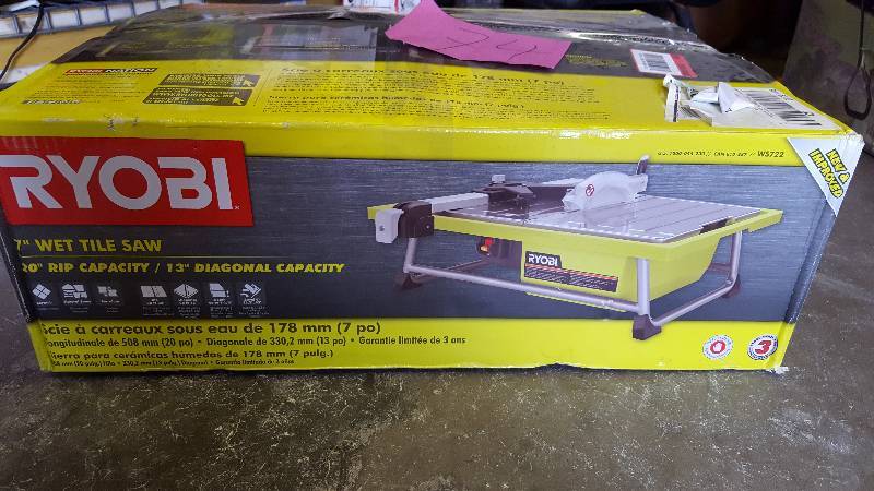 lot 74 image: Ryobi 7 Wet Tile Saw New