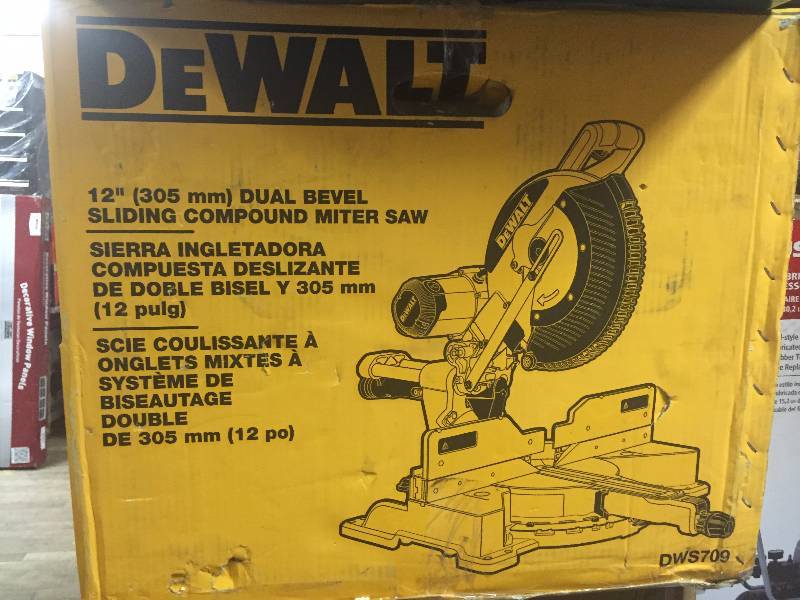 lot 113 image: Dewalt 15 Amp 12 in. Dual Bevel Sliding Compound Miter Saw DWS709 New