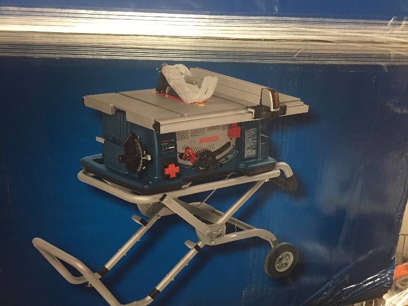 lot 114 image: Bosch 15 Amp 10 in. Table Saw with Gravity Rise Stand NEW Model # 4100-09