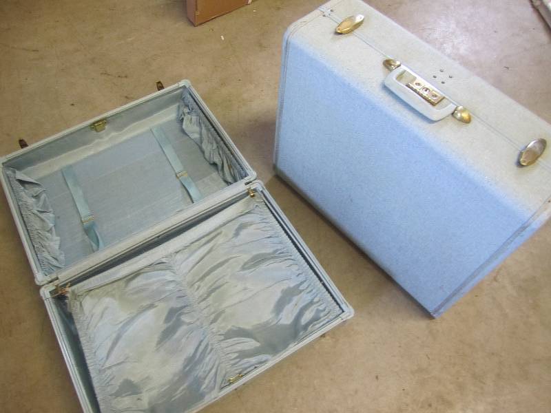 lot 57 image: 2 light blue vintage suit cases...