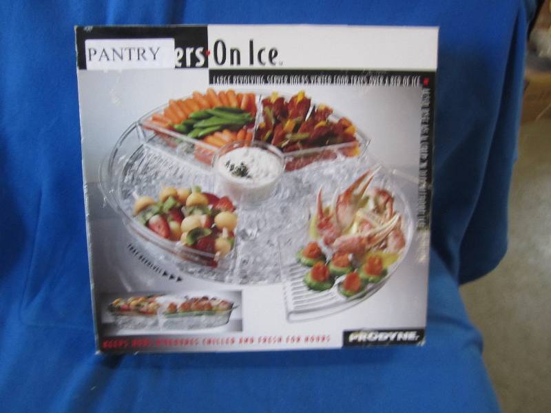 lot 64 image: Appetizers on ice serving tray...