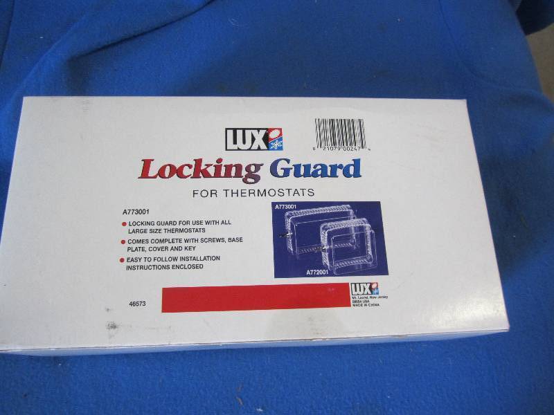lot 74 image: LUX locking guard for thermostats ...