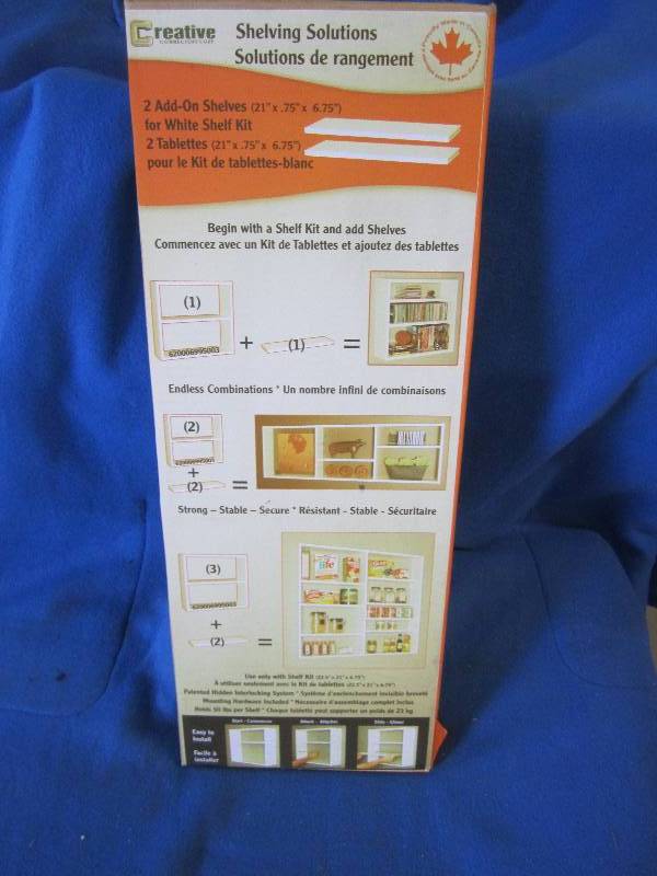 lot 82 image: white shelf set new in box...