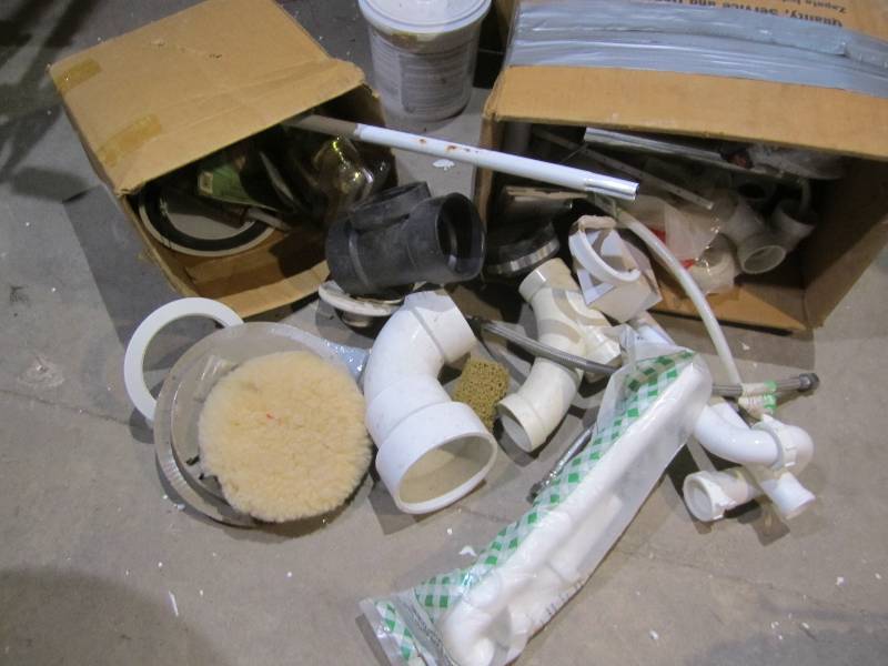 lot 100 image: Lot of plumbing supplies and door k...