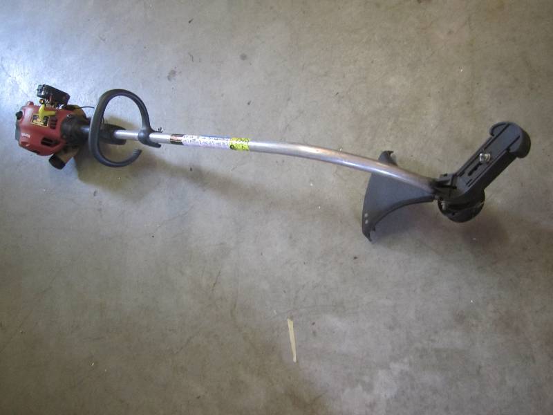 lot 214 image: Homelite weed whip ...