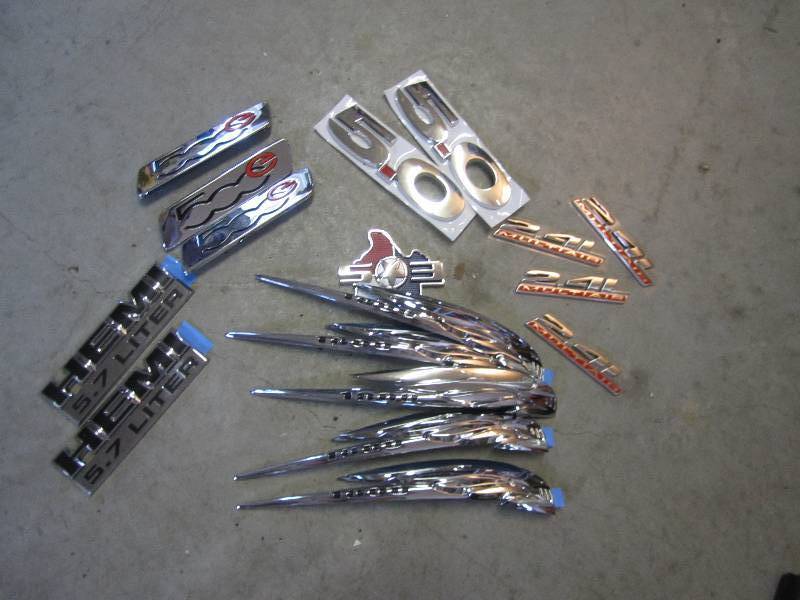 lot 217 image: Lot of genuine vehicle emblems, rea...