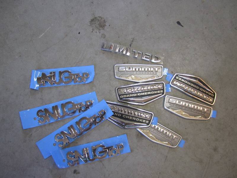 lot 219 image: Lot of genuine vehicle emblems, rea...