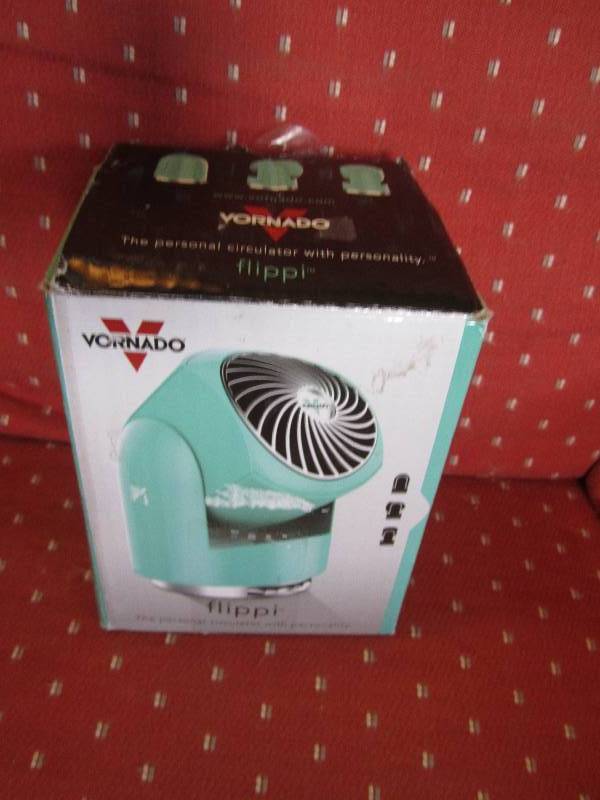 lot 243 image: Vornado flippi small fan teal color...