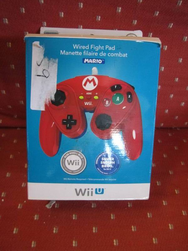 lot 253 image: WII u remote controller...