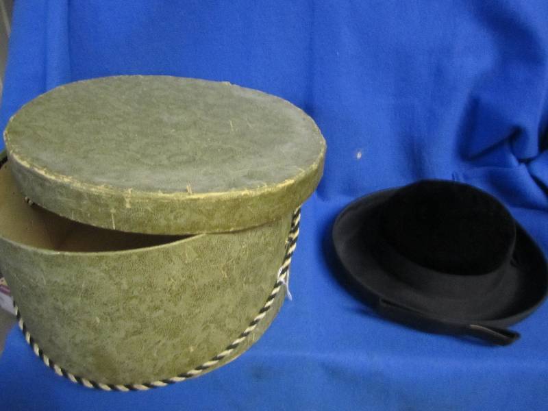 lot 8 image: Vintage black hat in vintage hat bo...