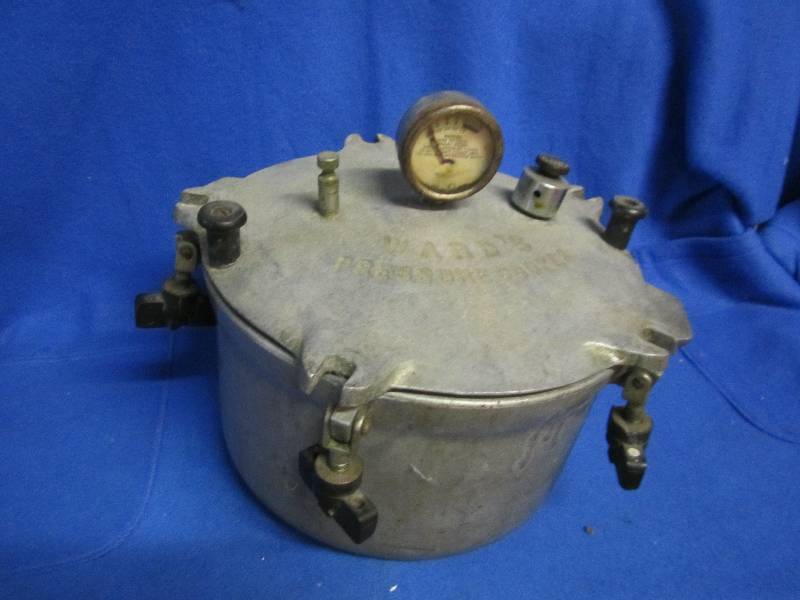 lot 23 image: Antique Wards pressure cooker ...