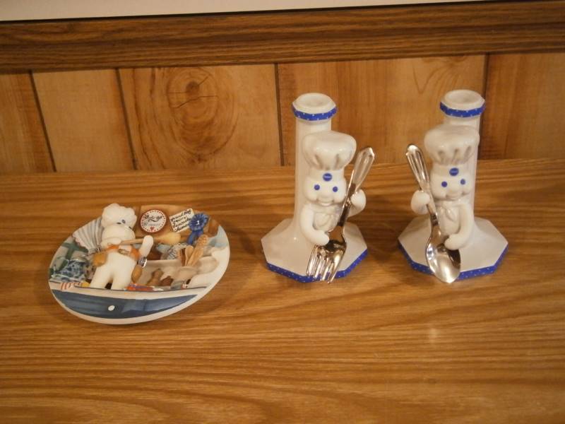 lot 17 image: (1) Danbury Mint Pillsbury 3-D Collector Plates (2) Candle Holders