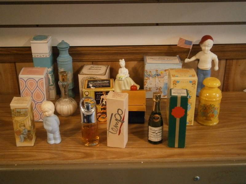 lot 25 image: (9) Avon Decanters (empty wboxes)