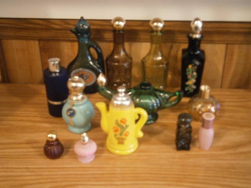 lot 37 image: (13) Avon Decanters (empty)