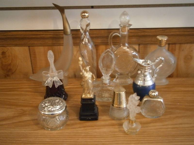 lot 38 image: (12) Avon Decanters (empty)
