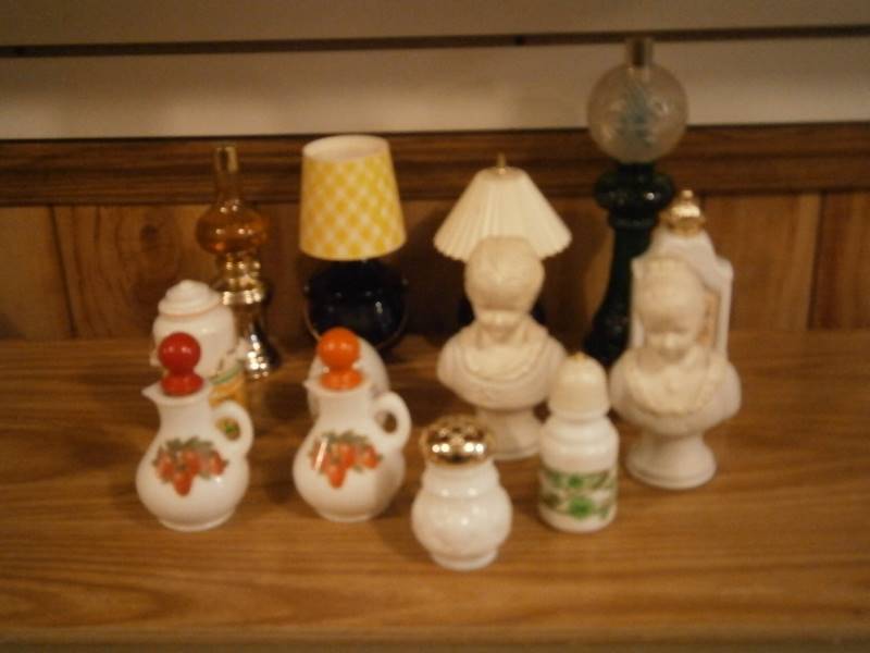 lot 42 image: (13) Avon Decanters (empty)