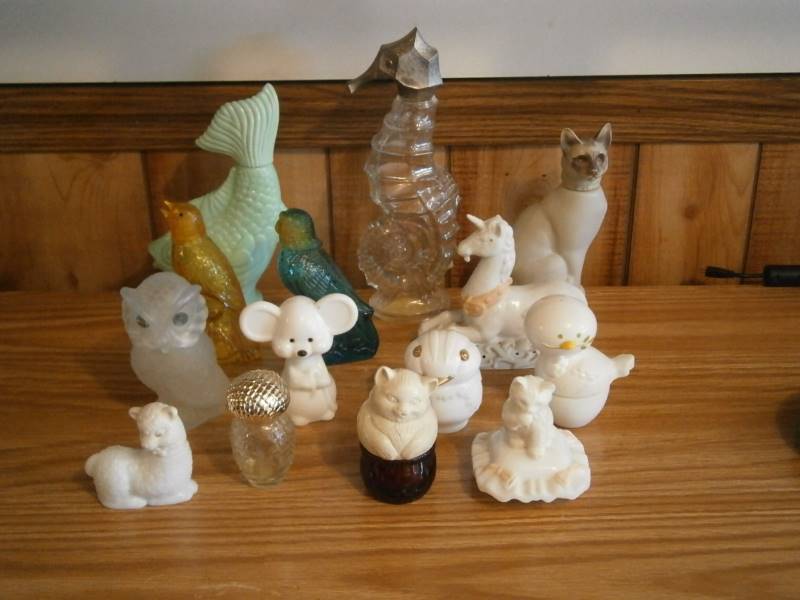 lot 46 image: (14) Avon Decanters (empty)