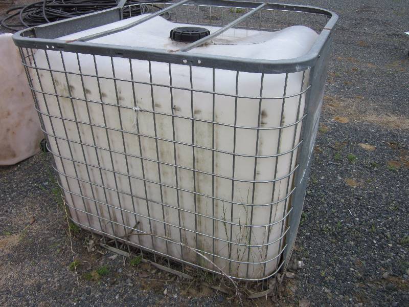 Water Tank in Cage
