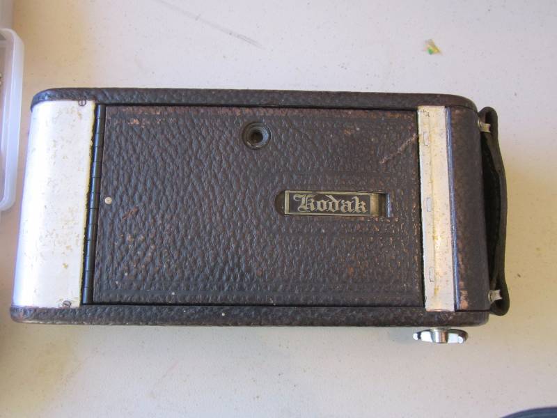 Old Kodak Camera, Watches, and Glasses