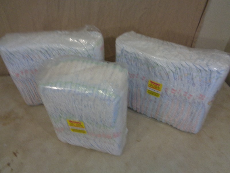 3 New Packages of Huggies Diapers