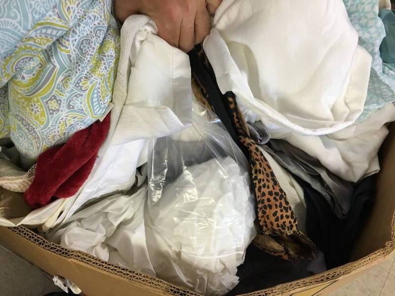 lot 178 image: Large gaylord of new sheets and curtains and bed sets  they just need to be sorted  these are new