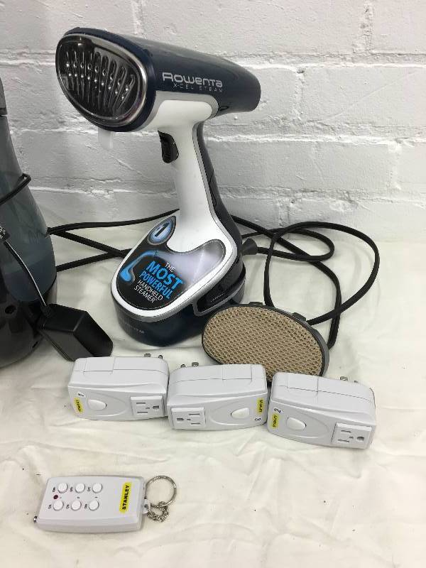 lot 219 image: alarm clock, black and decker vacuum and rowenta steamer