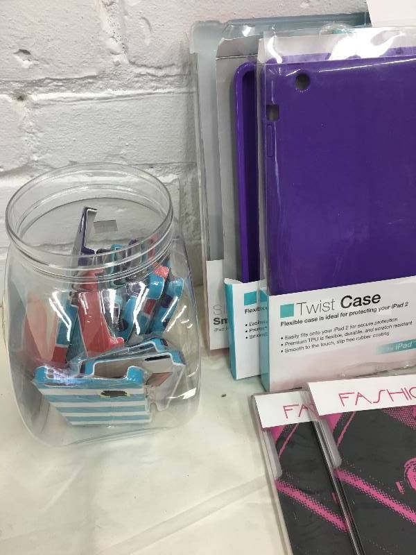 lot 222 image: iphone 5 cases with display  and 10 ipad cases