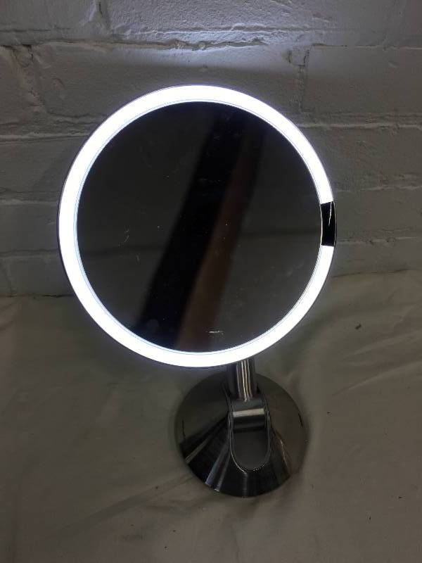 lot 346 image: simplehuman Sensor Mirror - Sensor-Activated Lighted Vanity Mirror, 5x Magnification, 8 inches retail $199