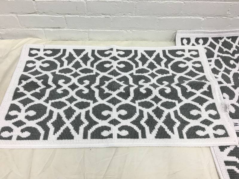 lot 361 image: two matching rugs