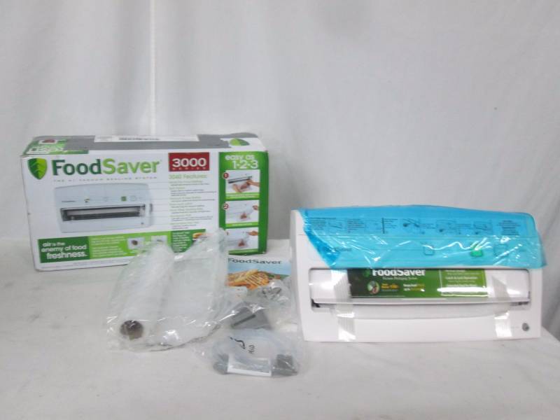 lot 18 image: FoodSaver Vertical Design Vacuum Sealing System
