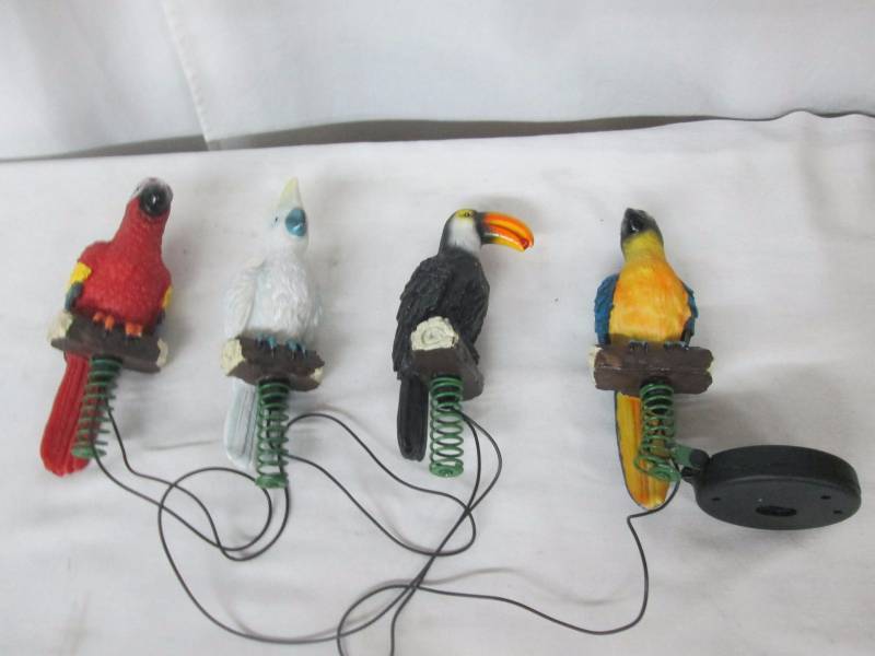 lot 55 image: Alcove Set of 4 Solar-Lighted Tropical Birds