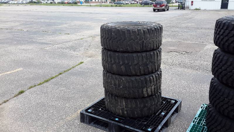 lot 21R image: Dick Cepek Crusher mud & snow LT30570R16 tires set of 4