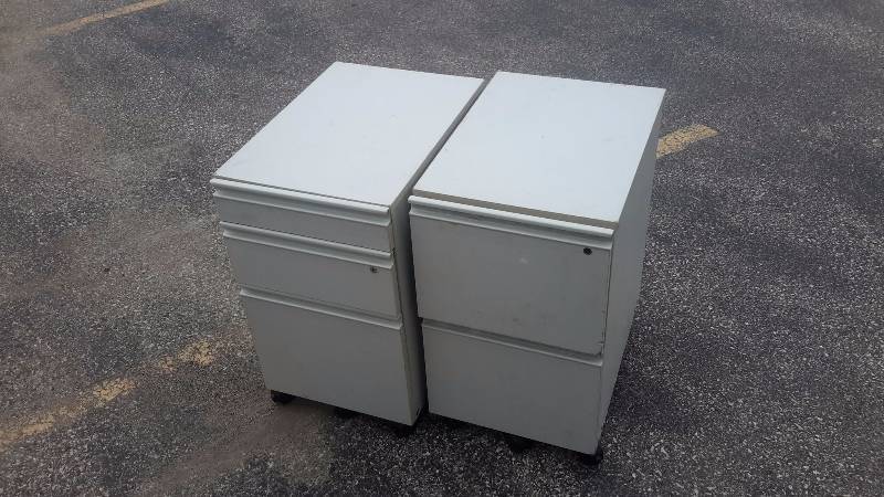 lot 29 image: Pair of file boxes with multiple drawers and Rolling Wheels