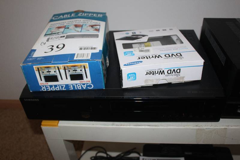 lot 39 image: Lot of (3) Including 1) Cable Zipper AND 1) DVD Writer AND 1) Samsung DVD Player